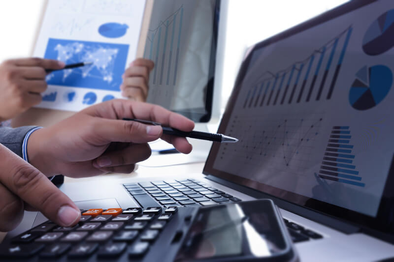 analyzing the work Accounting on Laptop investment concept.