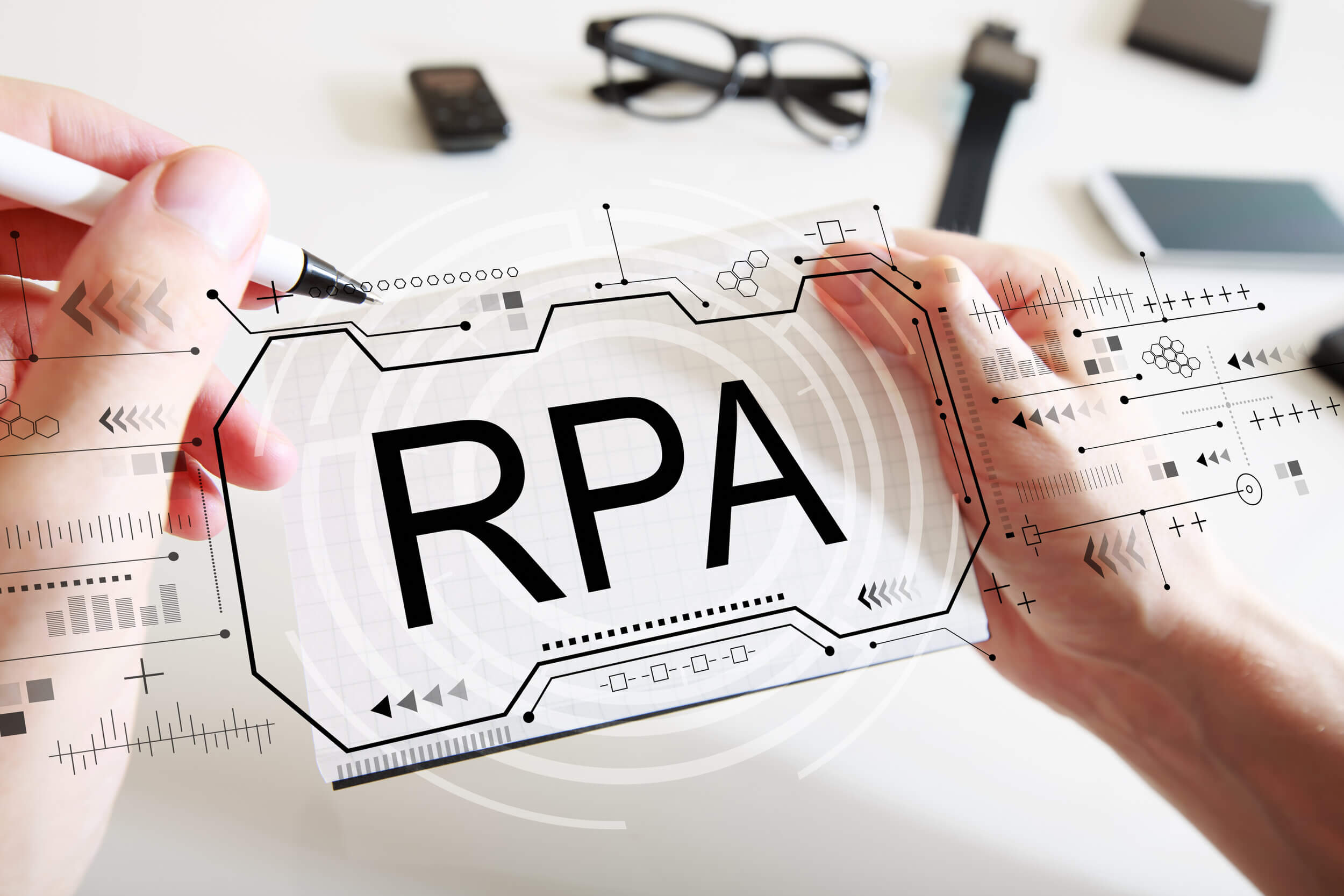 Robotic,Process,Automation,Concept,With,Man,Writing,In,A,Notebook
